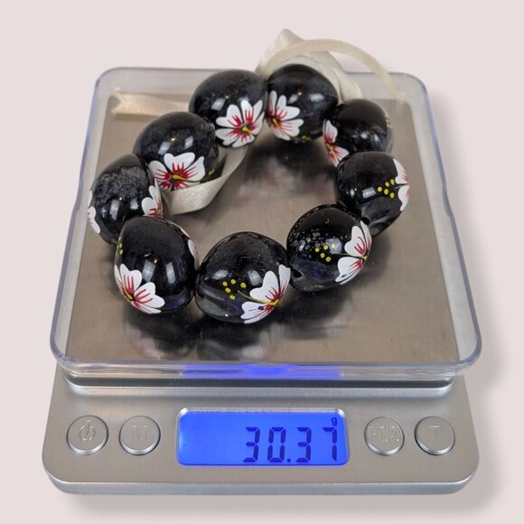 (2/$20) White & Red Floral Kukui Nut Stretch Bracelet - Picture 5 of 5